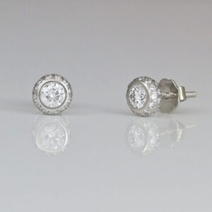 Perfect white diamond ear-studs in Platinum