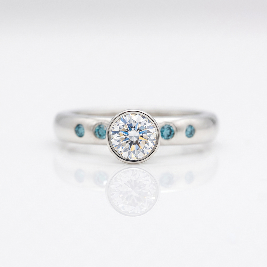 Rubover set blue and white diamond ring