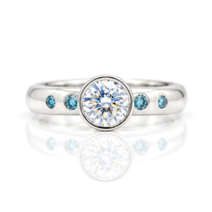 Rubover set blue and white diamond ring