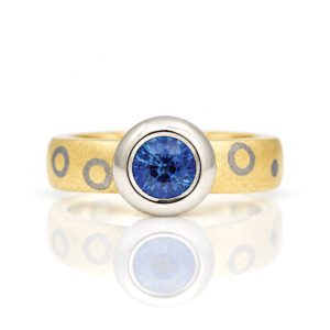 ub-over set sapphire on chunky ring