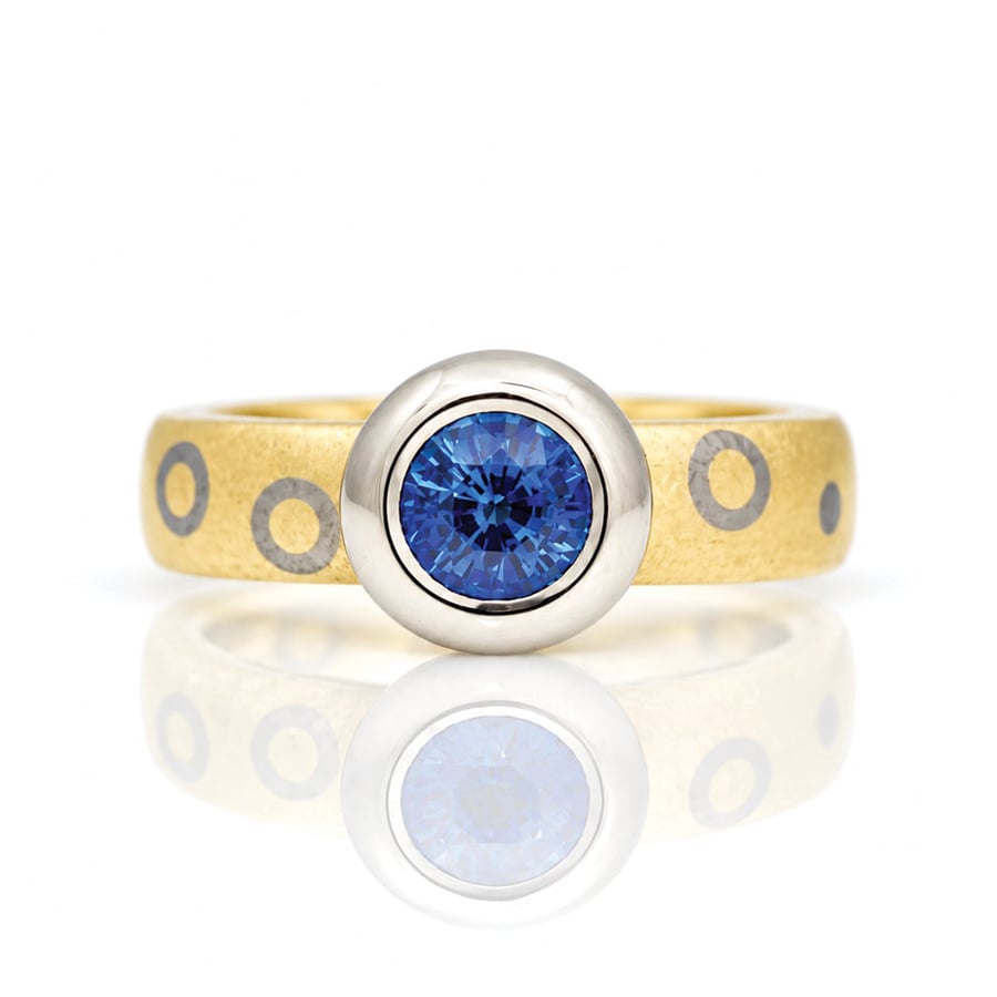 ub-over set sapphire on chunky ring