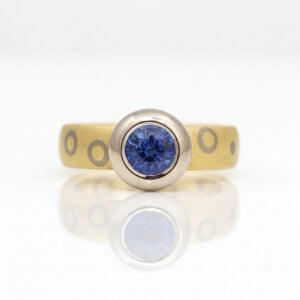 ru-over set sapphire on chunky ring