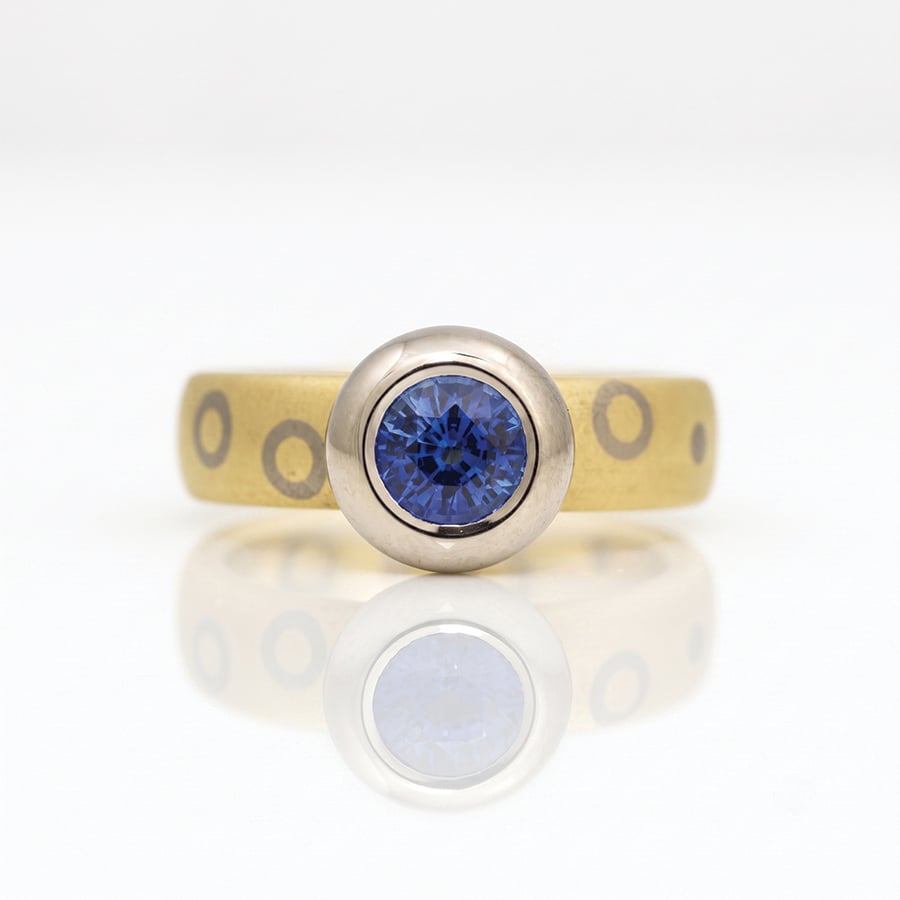 ru-over set sapphire on chunky ring