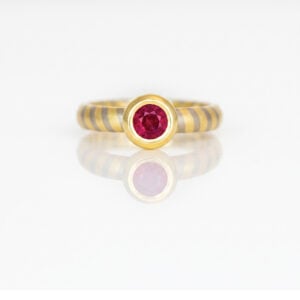 Modern ruby solitaire ring 18ct gold David Ashton 0945