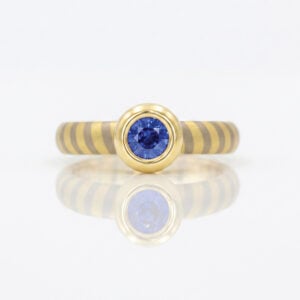 stripy ring with sapphire