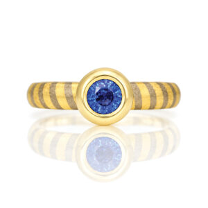 stripy ring with sapphire