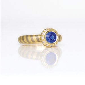 sapphire with diamodn halo stripey ring