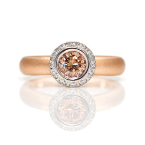 Pink champagne modern diamond engagement ring.