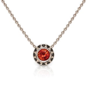 Modern orange sapphire and black diamond pendant
