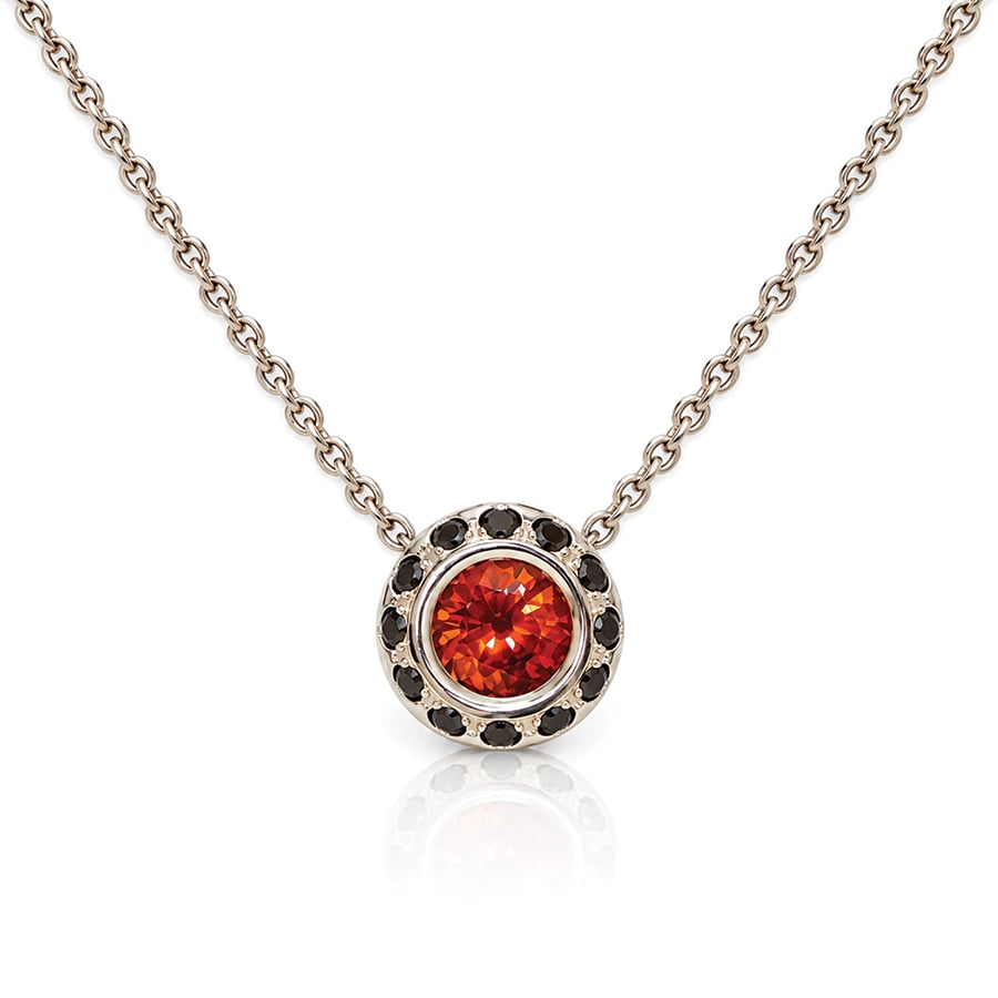 Modern orange sapphire and black diamond pendant