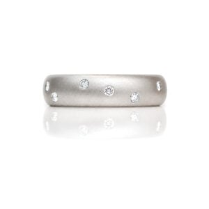 Flush set random diamonds in Platinum modern eternity or wedding ring 0499