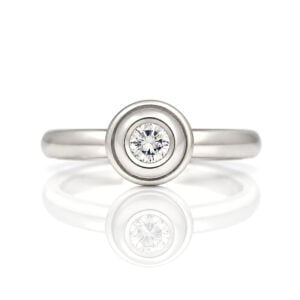Modern rub-over set diamond engagement ring David Ashton contemporary fine jewellery handmade in London bespoke