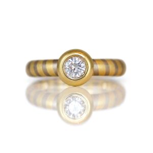 Modern diamond solitaire 18ct diagonal stripe ring