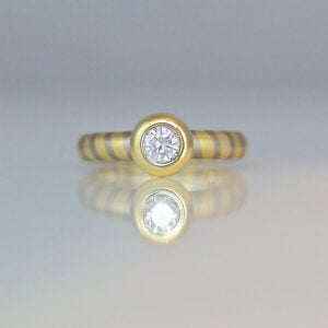 Modern diamond solitaire 18ct diagonal stripe ring