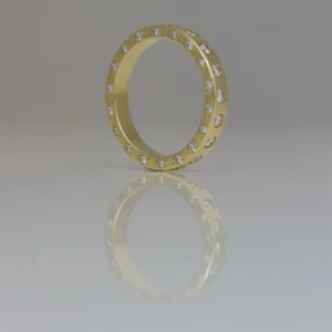 Diamonds set on all edges of 18ct gold ring.