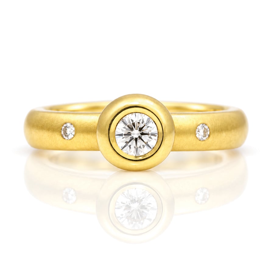 Modern rub-over setting diamond gold engagement ring