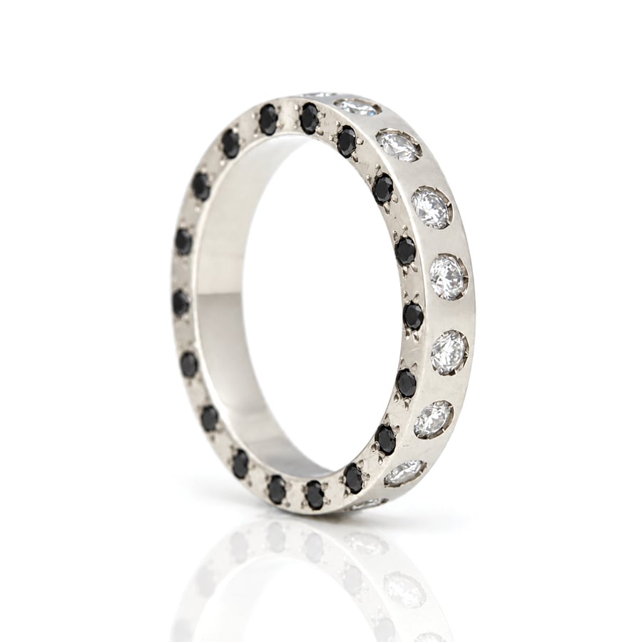 Unique eternity ring black and white natural diamonds