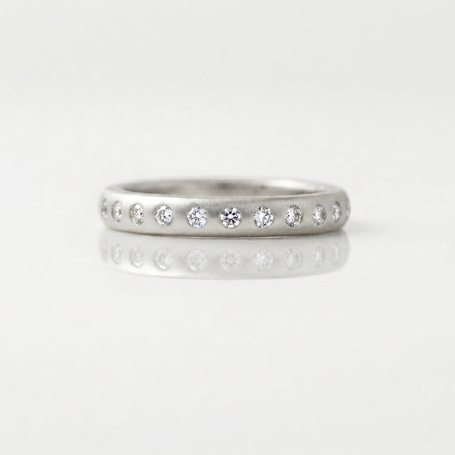 modern platinum diamond eternity ring