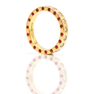 rubies and diamonds flush set in gold ring