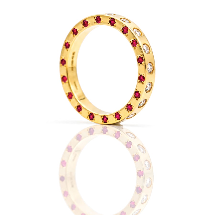 rubies and diamonds flush set in gold ring