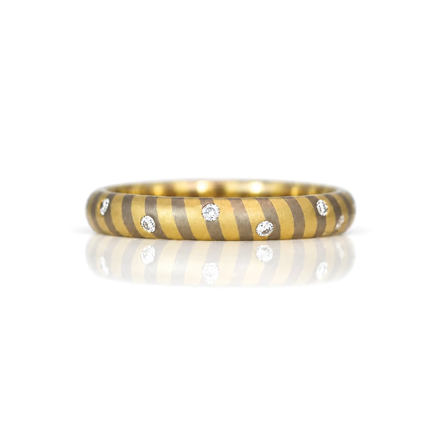 diagonal stripe 18ct gold ring with randomly flush set diamonds David Ashton modern