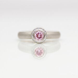 pink and white diamond modern engagement ring
