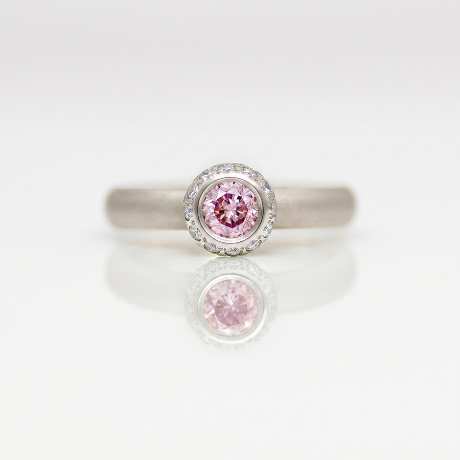 pink and white diamond modern engagement ring