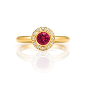 Burmese ruby rub-over set framed with diamonds in 18ct rose gold ring David Ashton 0958 Modern fine jewellery handmade in London bespoke