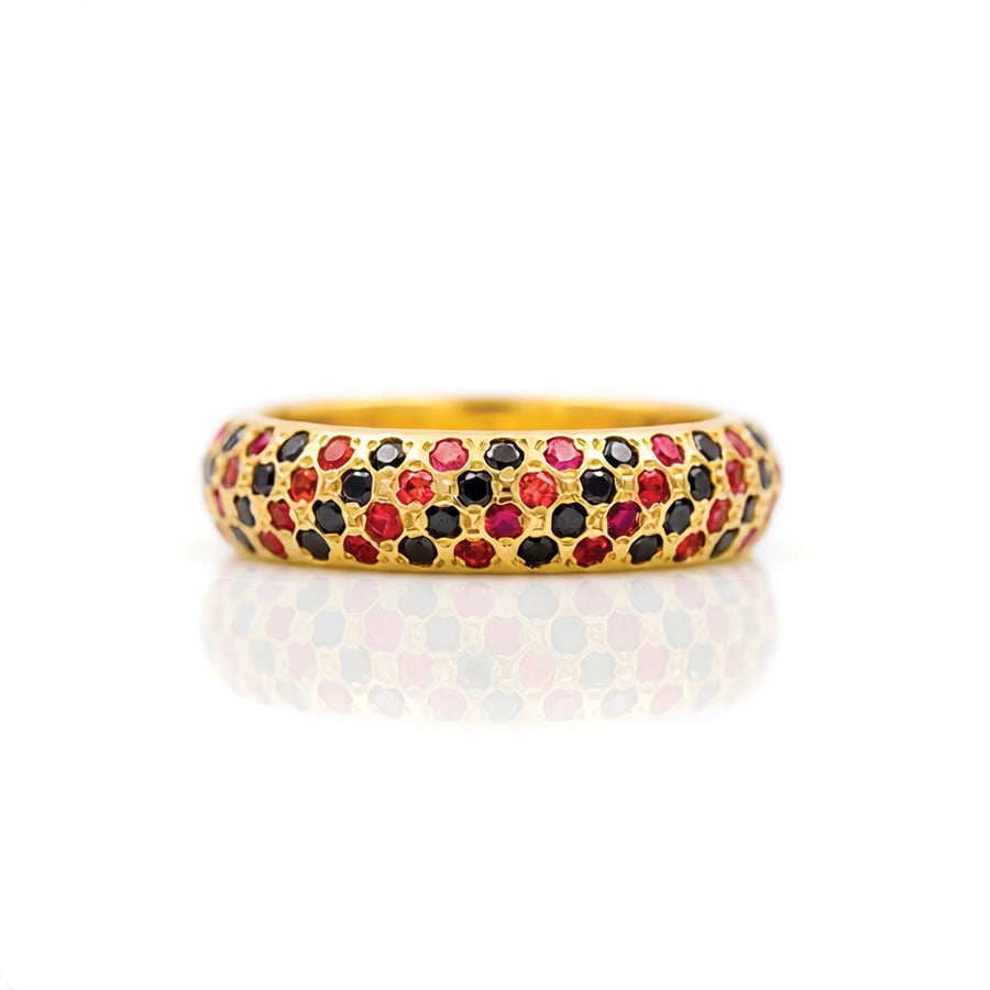 orange and black stone eternity ring