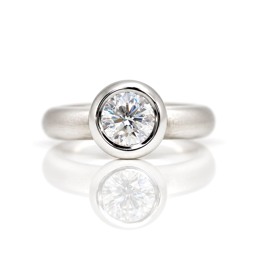Modern diamond engagement ring rub-over set Platinum David Ashton