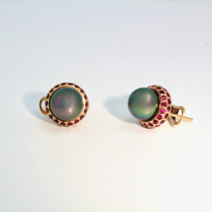 Tahitian pearls, with the finest rubies set in yellow gold contemporary ear-studs