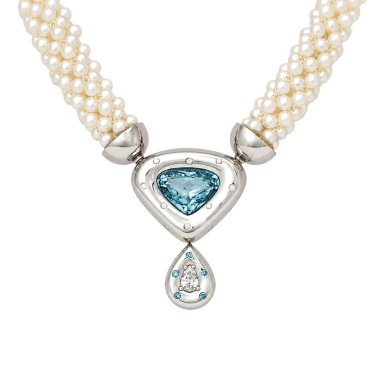 perfect blue aquamarine rub-over set in platinum with blue and white diamonds on pearl tube necklace David Ashton modern fine jewellery handmade in London