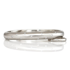 finest quality natural diamonds flush set in solid platinum hinged bangle David Ashton modern fine jewellery handmade in London bespoke