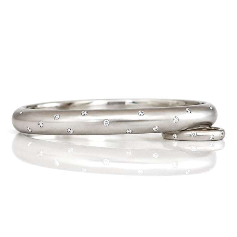 finest quality natural diamonds flush set in solid platinum hinged bangle David Ashton modern fine jewellery handmade in London bespoke