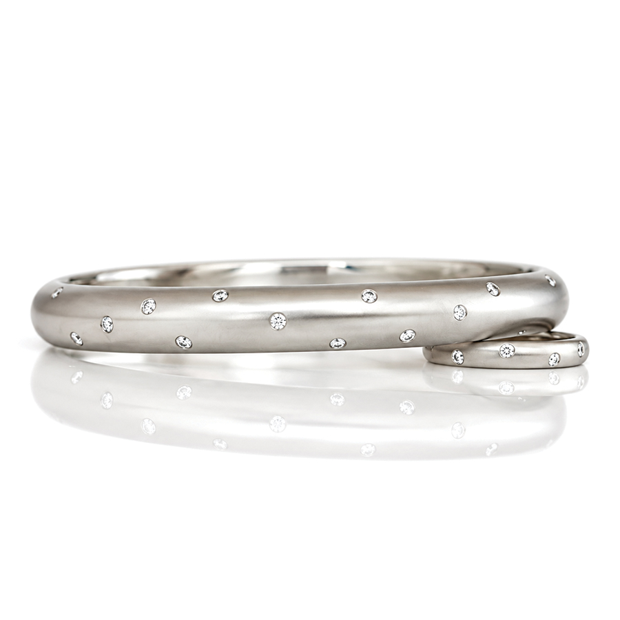 finest quality natural diamonds flush set in solid platinum hinged bangle David Ashton modern fine jewellery handmade in London bespoke