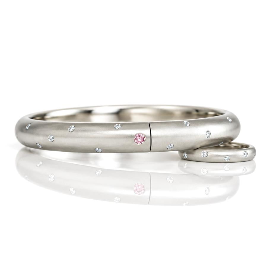 Platinum hinged bangle with pink and white diamonds