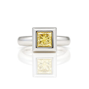 natural fancy yellow natural diamond rub-over set in Platinum ring David Ashton modern fine jewellery handmade in London