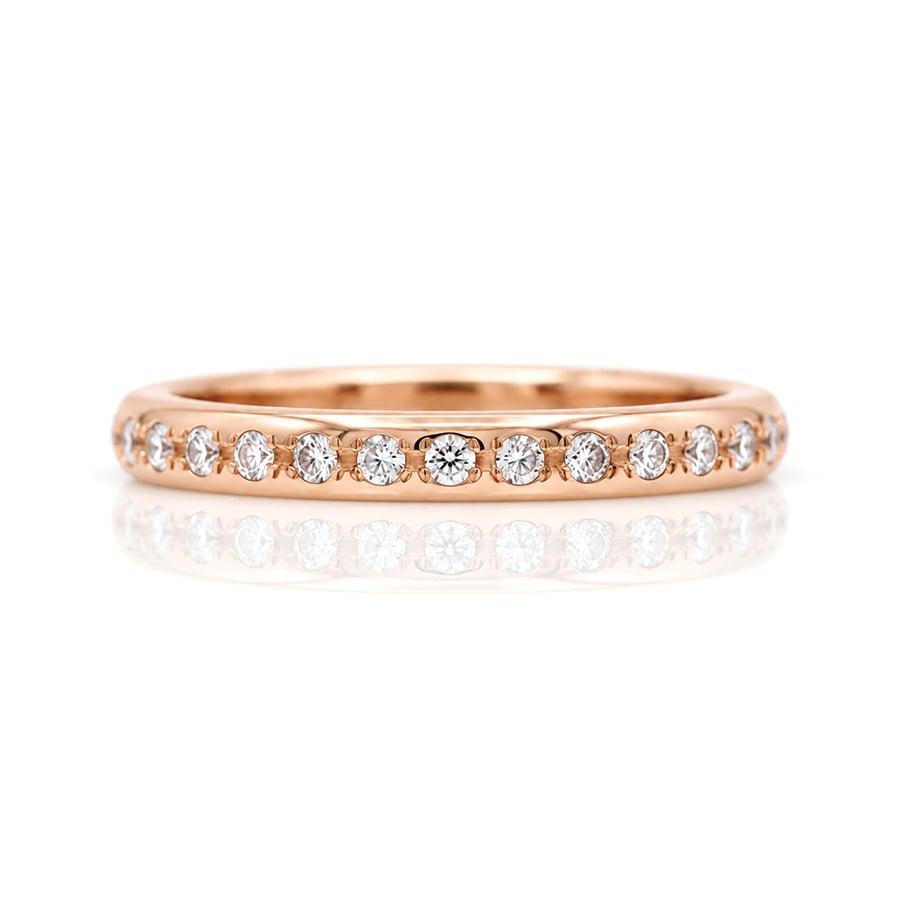 Narrow rose gold ring pave set with diamonds