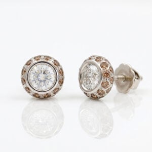 White diamonds framed with fancy cognac diamonds ear-studs