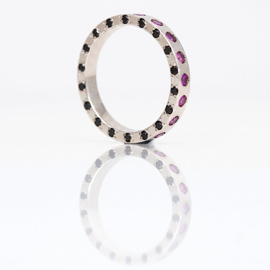 purple and black diamond eternity ring