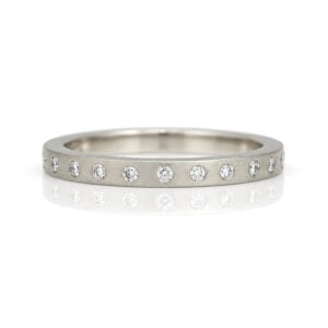Modern narrow flush set natural diamond eternity ring David Ashton 0873