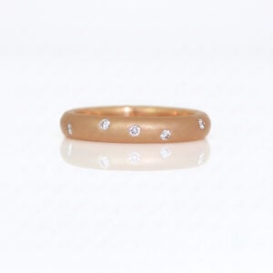 randomy set daimodns in rose gold ring 0988