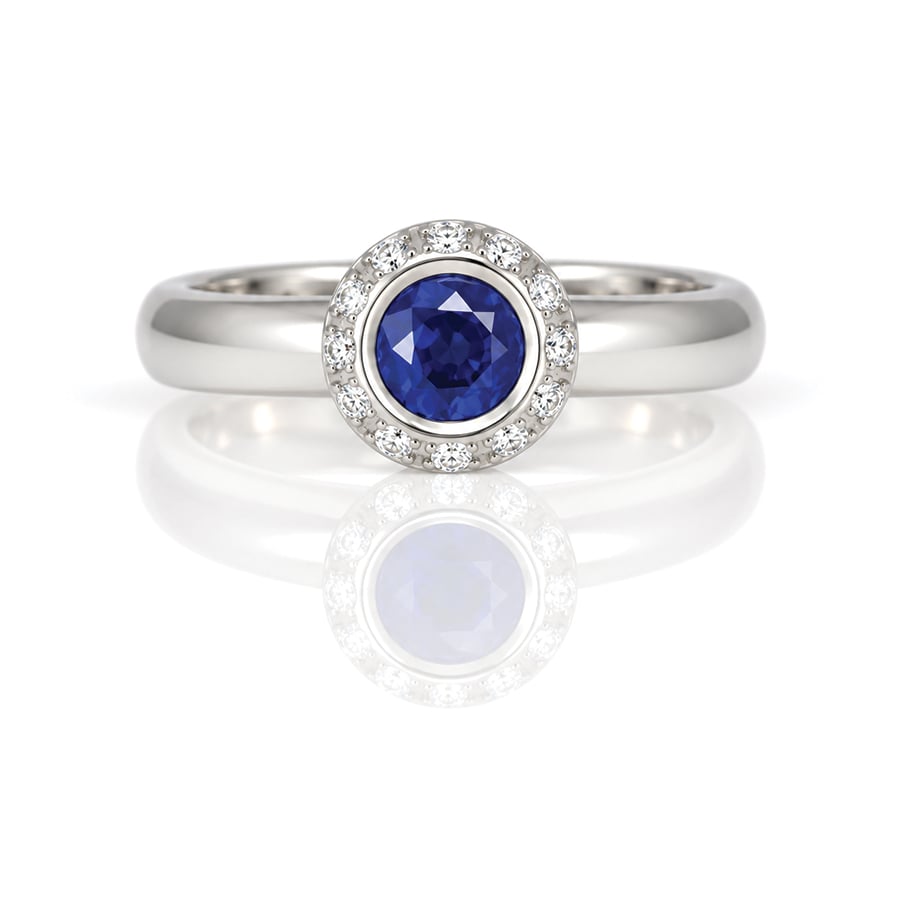 Vibrant sapphire, diamond and Platinum ring. 1001