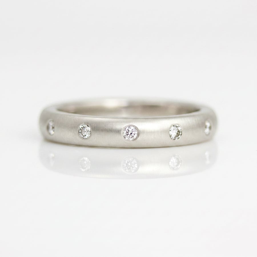 Modern platinum natural diamond eterity ring David Ashton 0828
