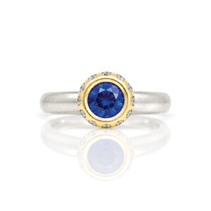 Vibrant sapphire modern solitaire