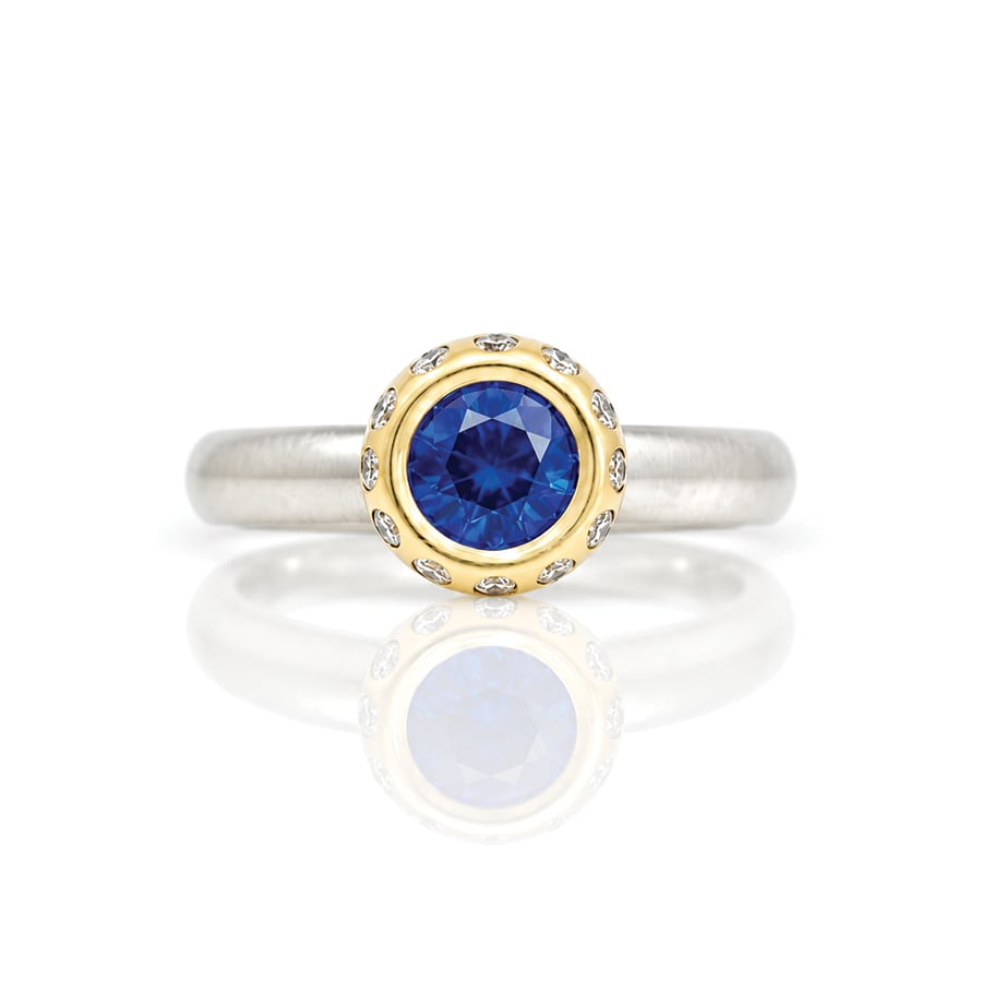 Vibrant sapphire modern solitaire