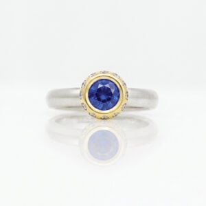 Vibrant sapphire modern solitaire