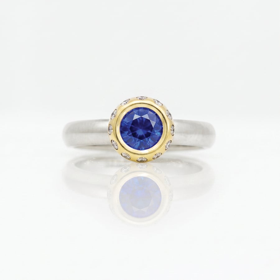 Vibrant sapphire modern solitaire
