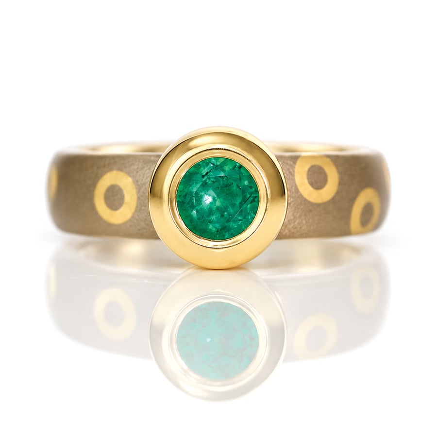 Round natural emerald set on 18ct yellow and white gold ring David Ashton