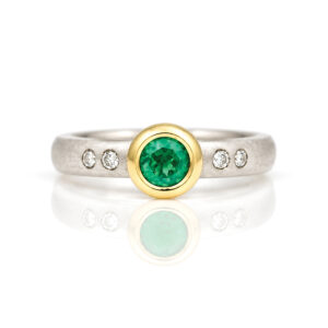 rubover set emerald ring